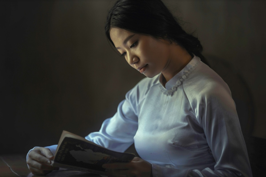 woman reading book